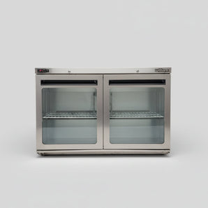 Stainless steel refrigerator with glass doors on a white background