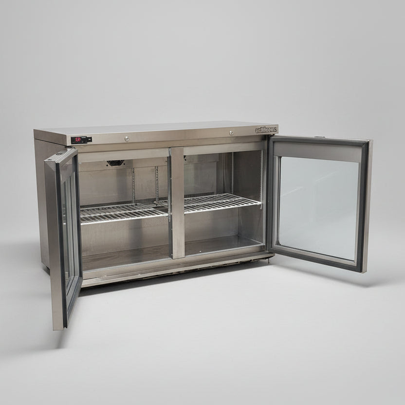 Stainless steel refrigerator with open doors on a white background